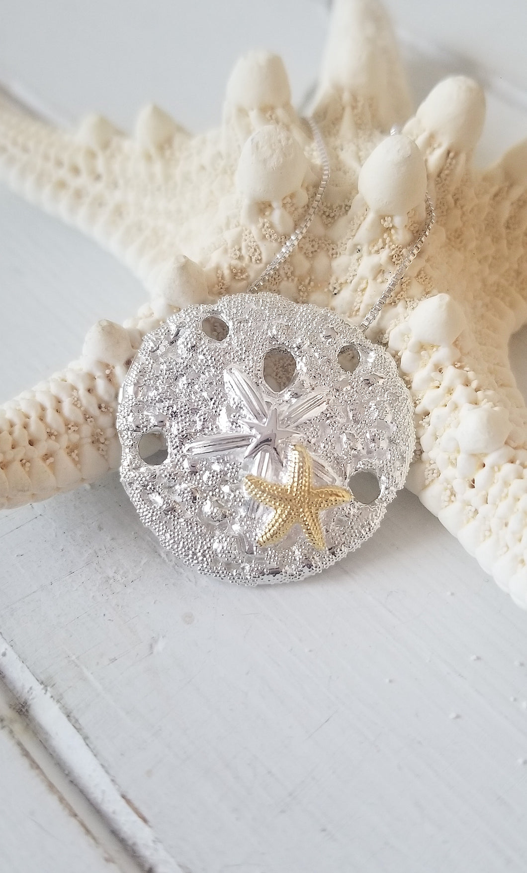 Sand dollar pendant - two tone with  2 starfishs