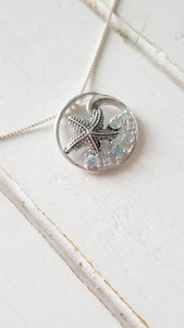 Knobby Starfish Pendant with Blue Topaz