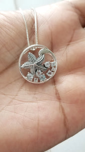 Knobby Starfish Pendant with Blue Topaz