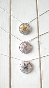 Knobby Starfish Pendant with Blue Topaz
