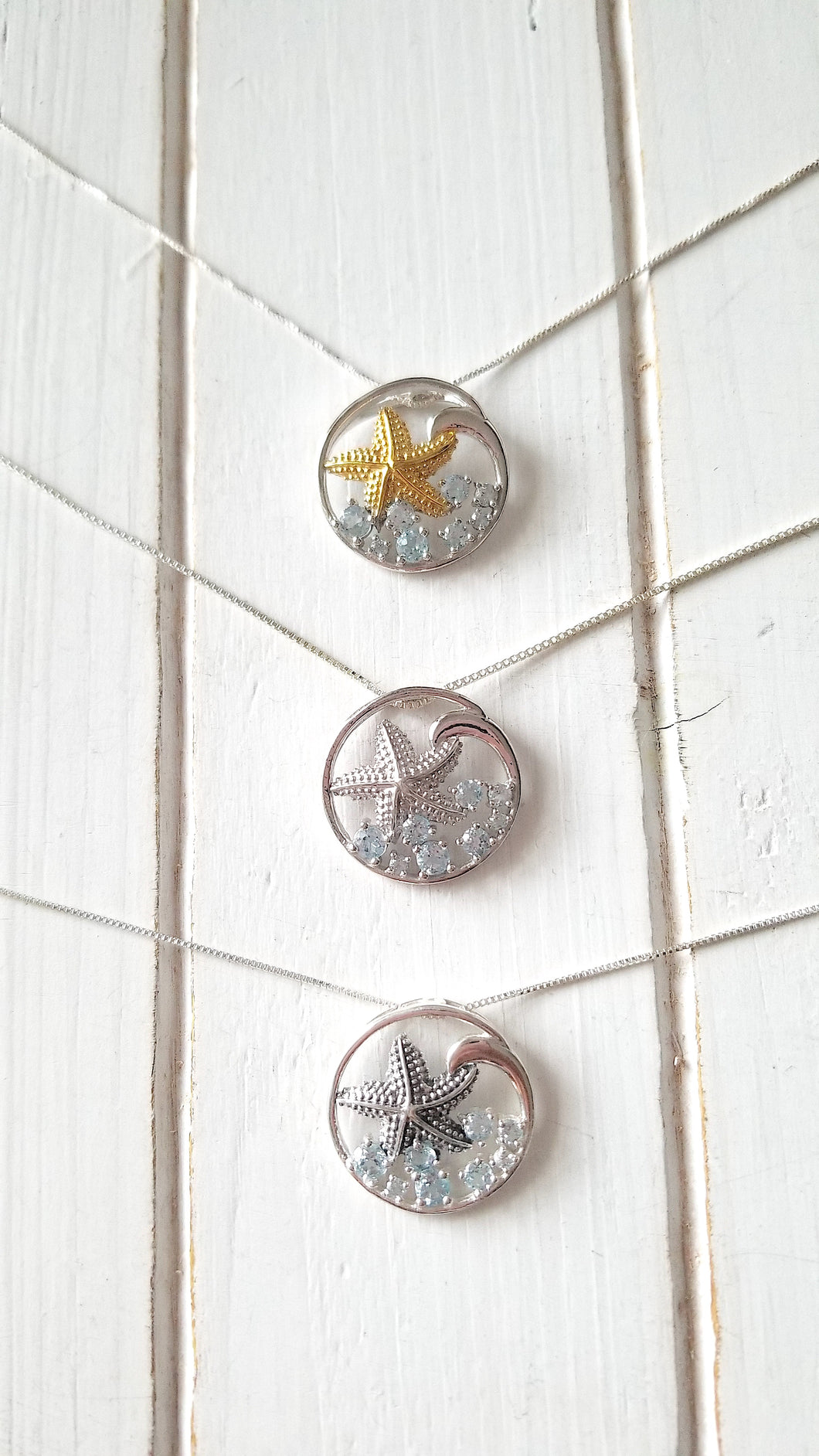 Knobby Starfish Pendant with Blue Topaz