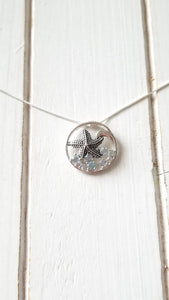 Knobby Starfish Pendant with Blue Topaz
