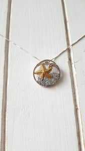 Knobby Starfish Pendant with Blue Topaz